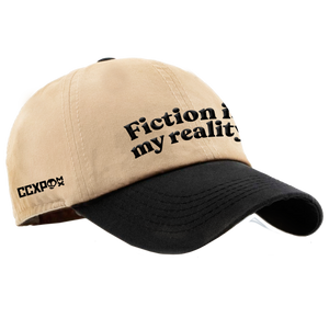 CCXP GORRA BEIGE/NEGRA FICTION IS MY REALITY